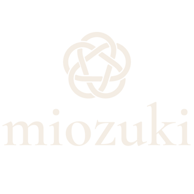 Miozuki NZ brand mark on neutral background